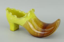 LINTHORPE MOTTLED GLAZE POTTERY MODEL OF A SHOE (yellow and brown glaze), 20cms long