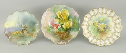 THREE ROYAL DOULTON HAND PAINTED CABINET PLATES including tiger signed 'C. Heart', floral spray