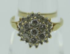 18CT YELLOW GOLD DIAMOND CLUSTER RING with centre brilliant-cut diamond approx, six surrounding