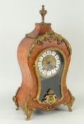REPRODUCTION GERMAN MANTEL CLOCK in the Rococo style, with circular dial bearing Roman numerals,
