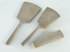 THREE PIECE ART DECO SILVER VANITY SET comprising hairbrush, clothes-brush and vanity-mirror, each