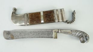 WHITE METAL ARABIAN DAGGER & SCABBARD, the handle in the form of a mythical bird creature, the