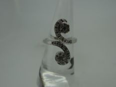 18CT WHITE GOLD DIAMOND SCROLL CLUSTER RING, 7.6gms