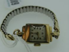 9CT GOLD WRISTWATCH ON BRACELET, in box, engraved 'To Enid from the boys'