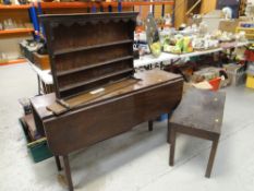 LONG ANTIQUE DROP LEAF TABLE / 19TH CENTURY MINIATURE WELSH DRESSER RACK and an antique table, 77cms