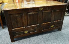 LATE 18TH CENTURY OAK COFFER-CHEST having four fielded panels to the facade over two doors with