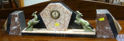 ART DECO MARBLE CLOCK GARNITURE with two flanking leaping metallic deer