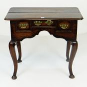 ANTIQUE LOW-BOY on cabriole corner supports, three drawers, carved arched frieze, 77cms wide