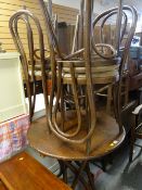 CIRCULAR BISTRO-TYPE TABLE with four vintage bistro-type bent-wood chairs