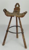 BELIEVED 19TH CENTURY PRIMITIVE WOODEN BIRTHING STOOL with tripod legs and metal stretcher