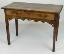 ANTIQUE OAK SIDE TABLE with single drawer, brass handles, carved arches to frieze, 95cms wide