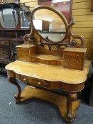 VICTORIAN MAHOGANY DRESSING TABLE having an open platform base with cabriole and scroll supports,