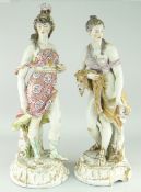 PAIR OF LARGE CONTINENTAL PORCELAIN FEMALE FIGURES in classical Roman dress, one with lion-skin, the