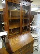 VINTAGE BUREAU BOOKCASE, the upper section with two glazed doors, the base with three drawers,