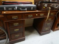 VINTAGE KNEEHOLE DESK, bank of nine drawers, 138cms wide x 84cms high x 59cms deep