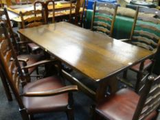 REFECTORY TABLE WITH SET OF 4+2 LADDER BACK CHAIRS having studded brown leather seats, comprising
