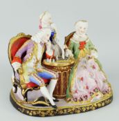 CONTINENTAL PAINTED BISQUE MODEL OF A CHESS GAME with three figures in Regency dress and