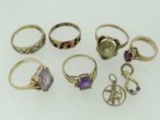 ASSORTED 9CT YELLOW GOLD JEWELLERY to include six stone set rings, pendant of archer design and ruby