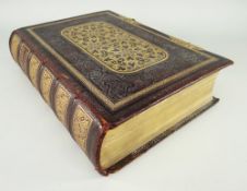 19TH CENTURY WELSH FAMILY BIBLE, full leather cover with gilt decoration and gilt metal clasps
