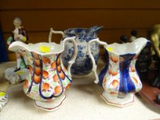 THREE WELSH POTTERY JUGS, two Gaudy Welsh patterned, together with a blue and white Bakers, Bevan