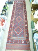 MESHWANI RUNNER, red and blue ground with single border and repeating central diamond pattern, 270 x