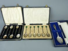 TWO CASED SETS OF SILVER COFFEE BEAN SPOONS and a boxed plated christening spoon