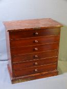SIX DRAWER STAINED PINE COLLECTORS' CHEST with 'Flatters and Garnett Limited, Manchester' label