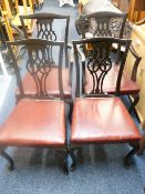 SET OF FOUR (TWO PLUS TWO), pierced splat-back salon chairs with red rexine covers to the seats