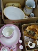 TWO VICTORIAN POTTERY WASH SETS and a mantel clock garniture