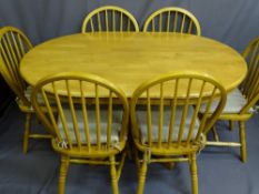 MODERN LIGHTWOOD PEDESTAL DINING TABLE, 150cms long and six stick back chairs