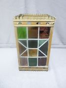 GOOD SQUARE METAL-FRAMED LIGHT LANTERN with four leaded and coloured glazed panels complete with