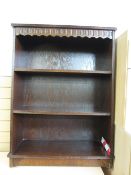 POLISHED THREE SHELF BOOKCASE with dentil type cornice