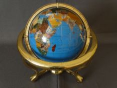 MODERN GLOBE ON BRASS EFFECT STAND with various mineral inlays