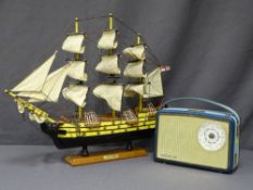 HMS VICTORY MODEL ON A PLINTH and a retro wireless by 'Perdio'