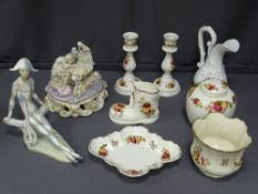 CONTINENTAL PORCELAIN CENTRE PIECE of a young woman of baby in crib, a Spanish porcelain figurine, a