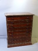 VINTAGE EIGHT DRAWER COLLECTORS' CHEST with ebony knobs containing a large unsorted quantity of mint