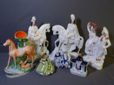 THREE STAFFORDSHIRE FLAT BACK FIGURINES, a horse and foal spill holder, cottage and two