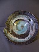 ROGER COCKRAM PIERCED STONEWARE BOWL with incised fish decoration, one with head in high relief,