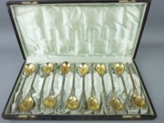 CASED SILVER SPOONS - set of twelve quality '800' silver spoons with gilt bowls and orb topped