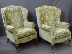 GOOD PAIR OF VINTAGE STYLE WING-BACK ARMCHAIRS with figured velvet upholstery, 103cms height,