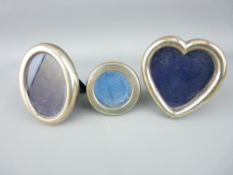 SILVER MINIATURE PHOTO FRAMES - one circular, one oval and one heart shaped, all marked 925