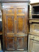 GEORGIAN OAK FLOOR DOOR STANDING CORNER CUPBOARD with shaped interior shelves, 202cms height, 117cms