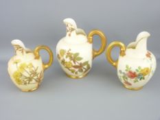 ROYAL WORCESTER - three non-matching graduated blush flat-back jugs, all with scuttle shaped