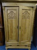 FRENCH STYLE STRIPPED PINE TWO DOOR WARDROBE with carved floral detail and single lower drawer on