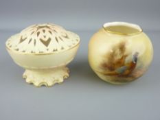 ROYAL WORCESTER - a small blush bowl with two painted pheasants in a landscape, signed by James