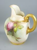ROYAL WORCESTER - glazed flat-back jug with scuttle spout and gilt handle and finely painted roses