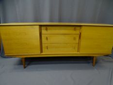 STYLISH MID-CENTURY LONG SIDEBOARD having three central drawers with flanking cupboard doors,