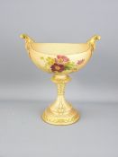 ROYAL WORCESTER - blush oval twin handled bowl with floral decoration on a shaped pedestal with
