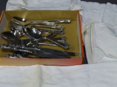 SMALL QUANTITY OF STAINLESS STEEL CUTLERY and table linen