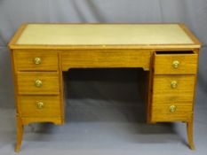 MID CENTURY TEAK DESK with gilt tooled leather insert to the top, 76cms height, 124cms width,